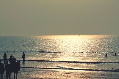 Scenic view of sea at sunset