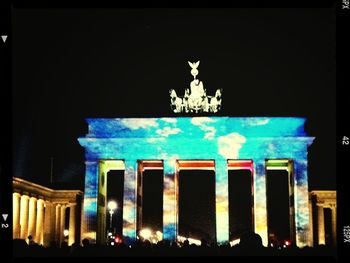 Low angle view of statue at night