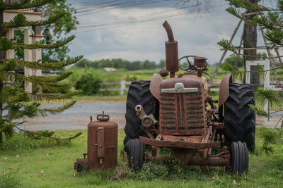 Abandoned tractor on field