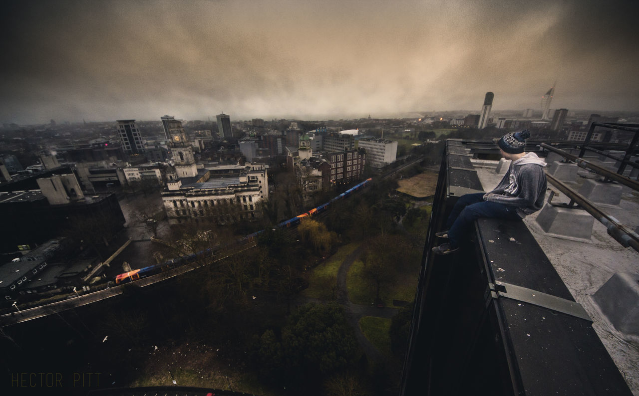 HIGH ANGLE VIEW OF ILLUMINATED CITYSCAPE