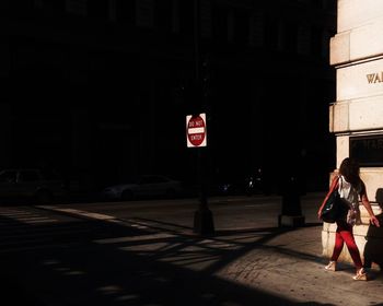 Woman standing in city