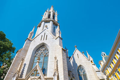 Low angle view of cathedral against blue sky