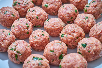 Close-up of meat balls, raw