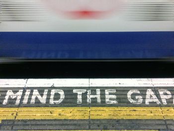 High angle view of text on subway station