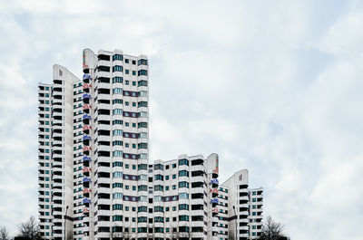 Low angle view of skyscraper against sky