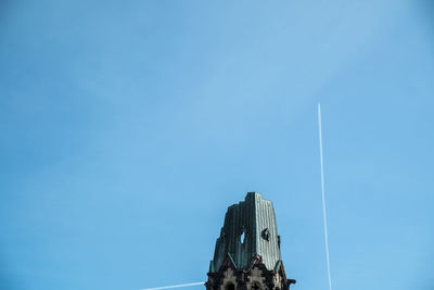 Low angle view of built structure against clear blue sky