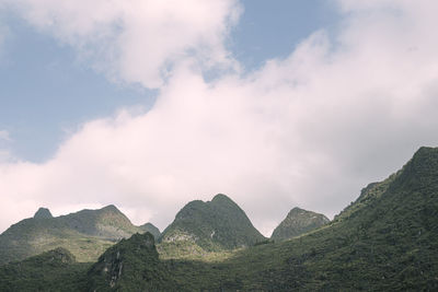 View of mountain range against cloudy sky