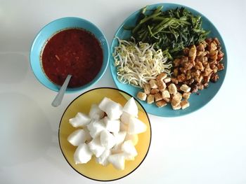 High angle view of salad in bowl on table