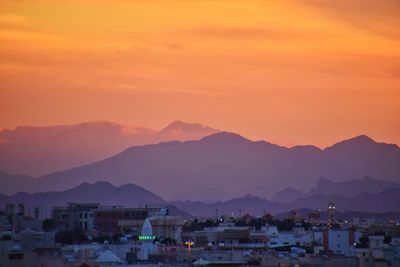 High angle view of townscape against sky during sunset