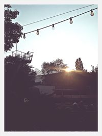 Low angle view of street light against sky