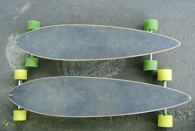 Longboards are on the pavement. two boards of different sizes. top view on walking skateboards. 