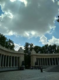 Building against cloudy sky