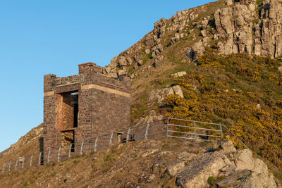 Low angle view of old building against sky