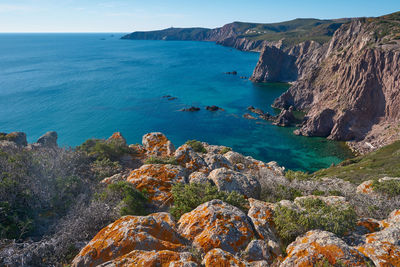 Scenic view of sea against sky from a high cliff