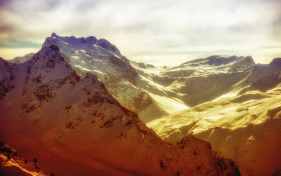 Low angle view of mountain against sky during sunset