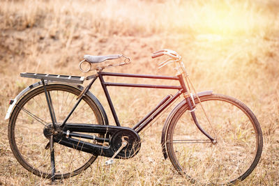 Bicycle parked on field