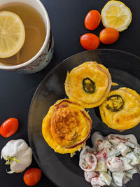 High angle view of fruits in plate on table