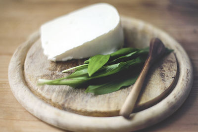 Close-up of bread in plate on table