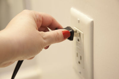 Close-up of person hand holding camera