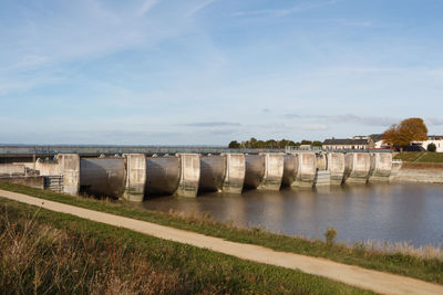 Bridge over river against sky