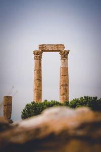 Low angle view of roman ancient against clear sky