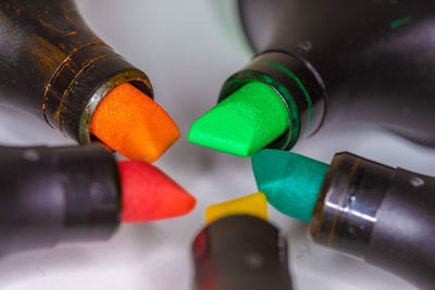 Close-up of multi colored pencils on table