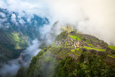 Scenic view of clouds over mountain