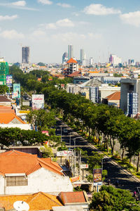 High angle view of buildings in city against sky