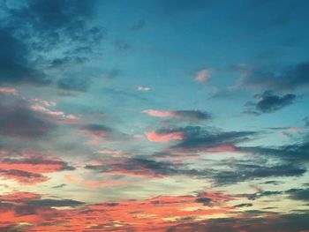 Low angle view of dramatic sky during sunset