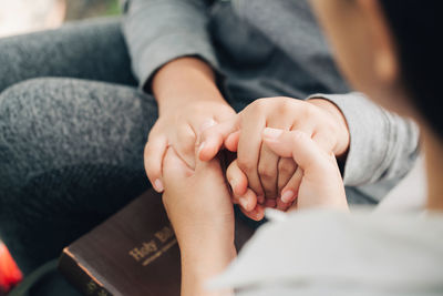 Close-up of couple hands