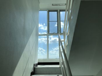 Low angle view of glass window in house