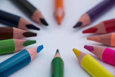 Close-up of colored pencils on table