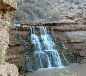 Waves flowing through rocks