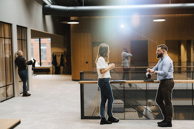 Business people in office lobby