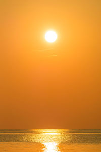 Scenic view of sea at sunset