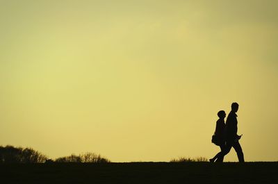 Woman looking at sunset