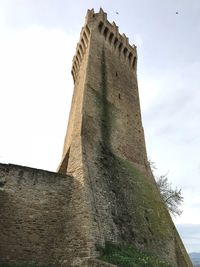 Low angle view of fort against sky