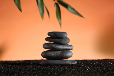Close-up of stone stack on rock