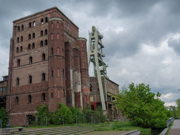 Low angle view of historical building against sky