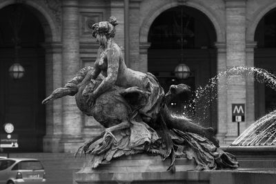 Statue of woman at night