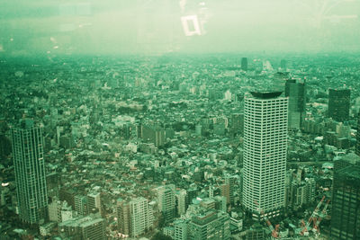 Close-up of water drops against sky