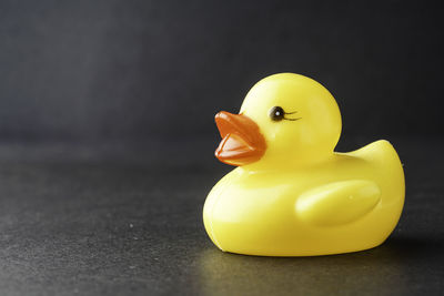 Close-up of yellow toy on table