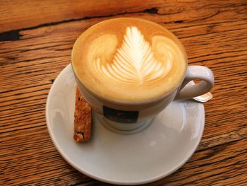 High angle view of cappuccino on table