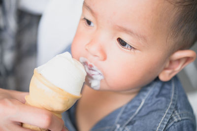 Close-up of boy holding ice cream