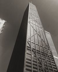 Low angle view of modern building against sky