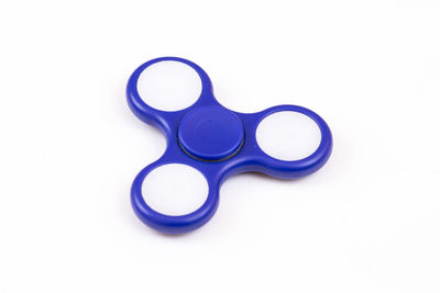 High angle view of human face against white background