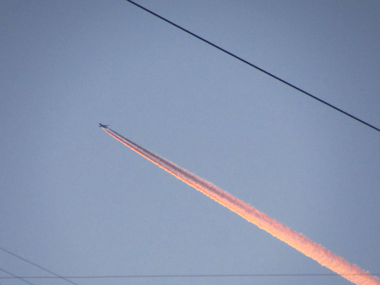 LOW ANGLE VIEW OF VAPOR TRAIL IN SKY