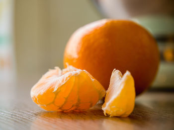 Close-up of orange slice on table
