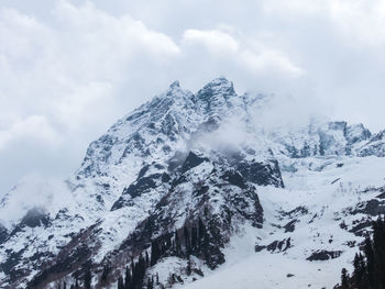 Scenic view of snow covered mountains