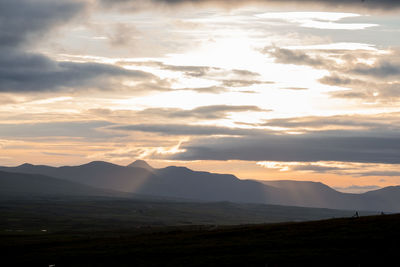 Scenic view of silhouette landscape against sky during sunset